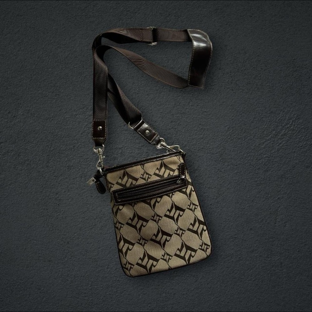 Brown and tan adjustable strap bag